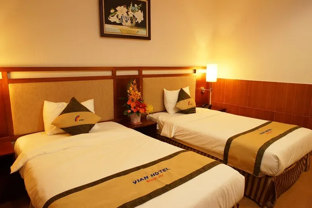 غرفة ديلوكس ثلاثية بسرير كوين وسرير فردي بإطلالة على المدينة، Vian Hotel 3/7