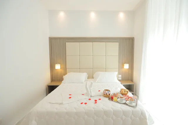 غرفة قياسية رباعية بسرير كوين وسريرين منفصلين، Garibaldi Suite 1/10