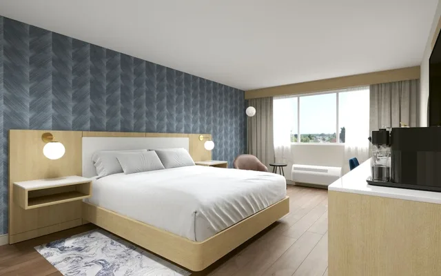 استوديو ديلوكس بسرير كينج مع أريكة، Kanata Kelowna Hotel and Conference Centre 1/5