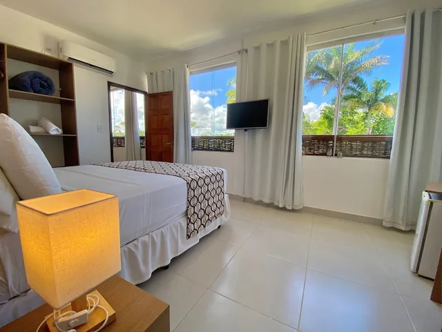 Sol, Family, Suite, 1 Queen and 3 Single Beds, Balcony، Pousada Encontro das Aguas 1/8