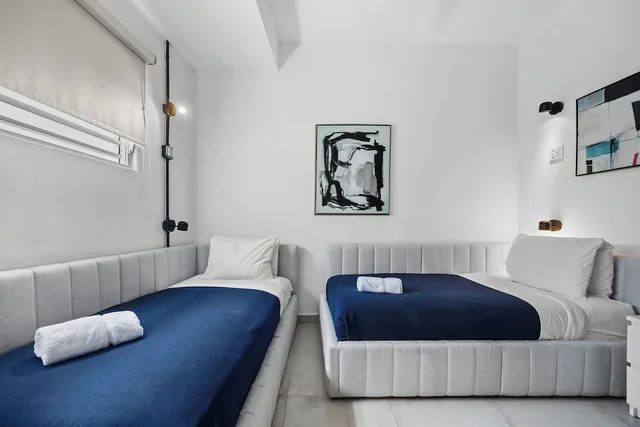 غرفة قياسية بسريرين منفصلين، La Buena Vida Inn 1/7