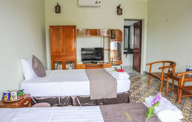 غرفة ديلوكس ثلاثية بسرير كوين وسرير فردي، La Belle Vie Tam Coc Homestay 1/2