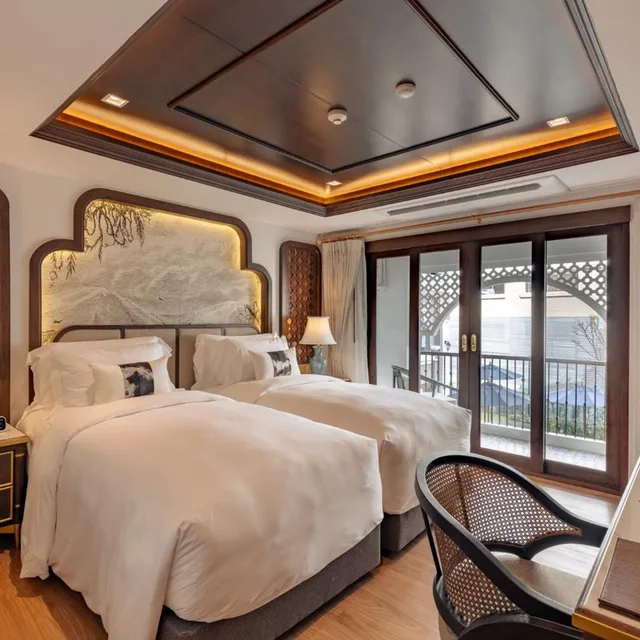 غرفة بسريرين منفصلين بشرفة، CHINO at Nimman Luxury Boutique Hotel 1/6