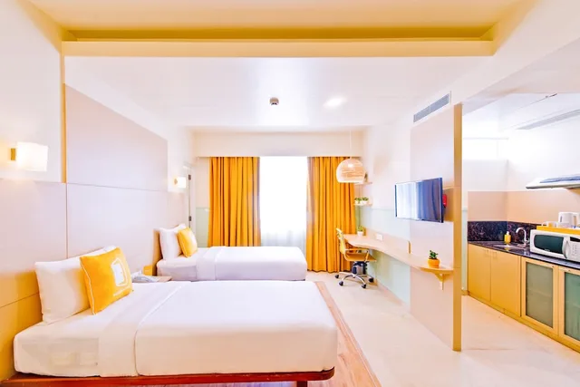جناح ديلوكس بسريرين منفصلين وسرير كينج، Bloom Hotel Indiranagar 2/4