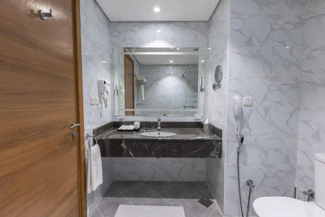 غرفة عائلية بسرير كينج وثلاثة أسرّة، فندق وأجنحة تايم ربا(TIME Ruba Hotel & Suites) 7/8