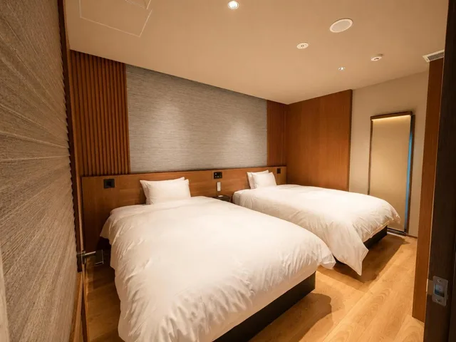 غرفة بسرير مزدوج مع سرير إضافي، Amane Resort Seikai 1/3