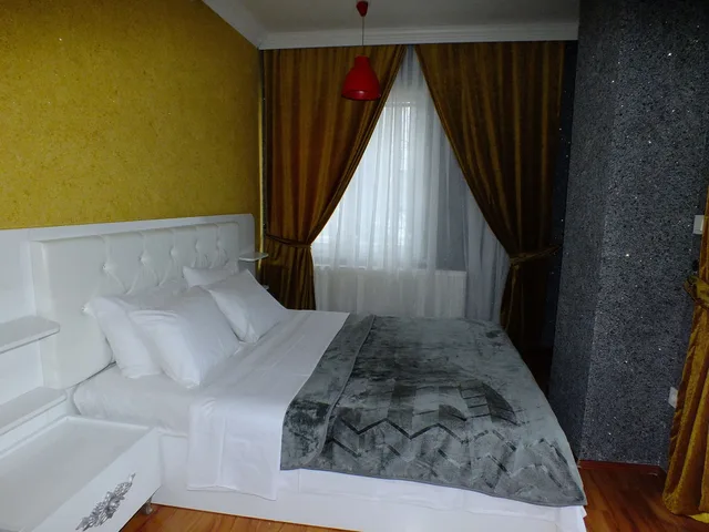 شقة ديلوكس بسريرين كينج بغرفتي نوم مع أريكة، Artura Suite 3/6