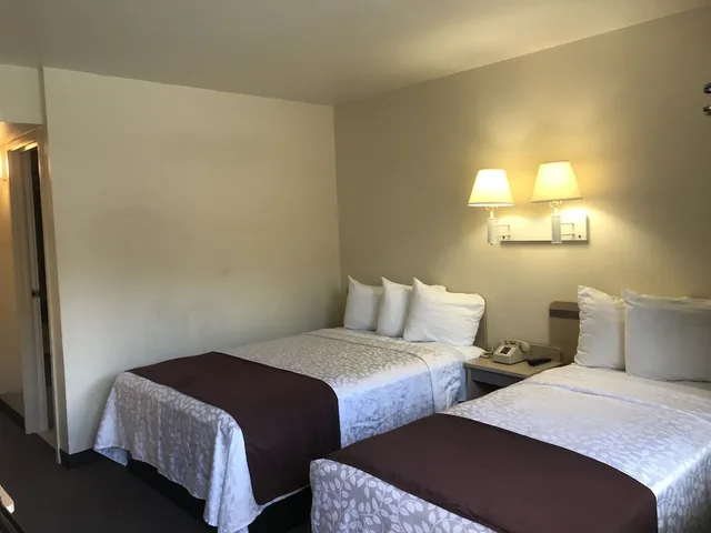 Room, 1 Double and 1 Single Bed, Americas Best Value Inn Lake City 3/8