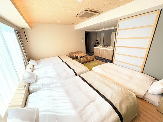 غرفة يابانية بريميوم ثلاثية بفراش فوتون وسريرين مزدوجين وسرير فردي، Tosei Hotel Cocone Tsukiji Ginza Premier 1/1