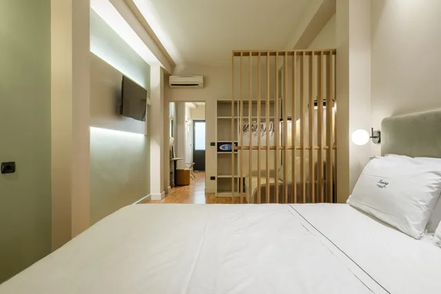 جناح جونيور مع أريكة، Touring Hotel Bologna 1/3