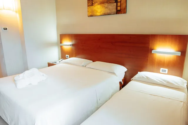 غرفة ثلاثية بسرير مزدوج وسرير فردي، Hotel Amico 2/4