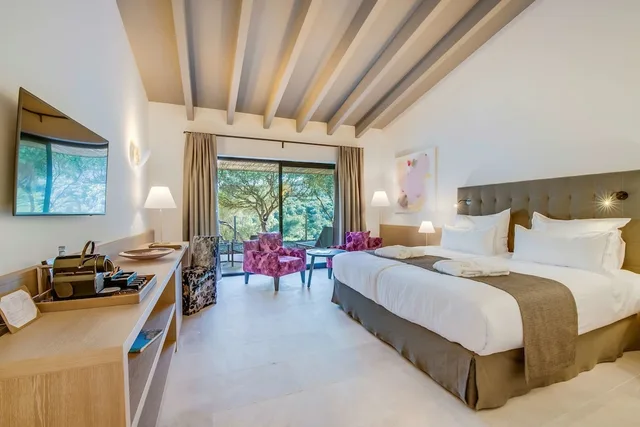 Petite, King Bed، Carrossa Hotel Spa Villas 1/3