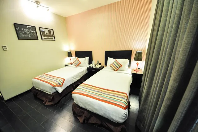 غرفة قياسية بسرير مزدوج أو سريرين منفصلين، The Travotel Suites 1/1