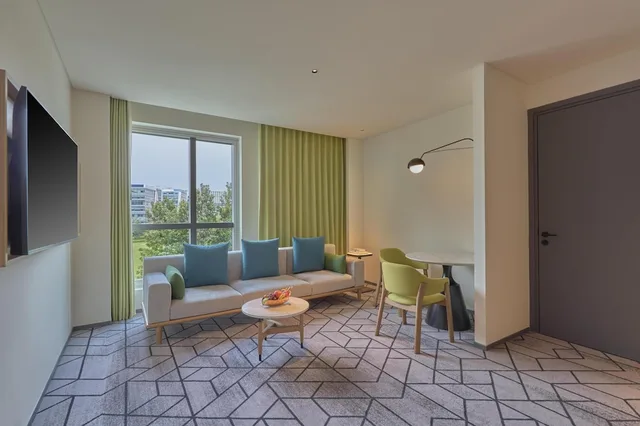 جناح ديلوكس بسرير كينج بغرفة نوم واحدة، Hilton Garden Inn Bengaluru Embassy Tech Village 2/4