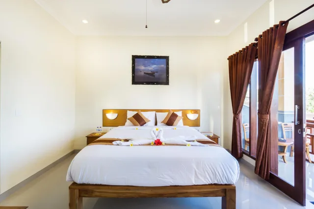 غرفة بسرير كينج بشرفة، Seaweed Guesthouse Lembongan 1/2