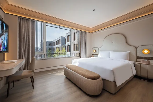 جناح ديلوكس بسرير كينج وسرير مزدوج وسرير فردي، Mercure Hangzhou West Lake Yuquan 1/3