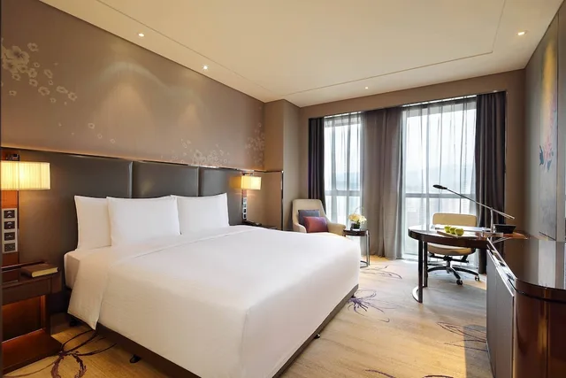غرفة تنفيذية بسرير كينج، Wanda Realm Guangyuan 1/7