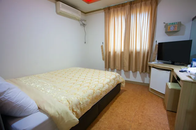 غرفة بسرير كوين، Suanbo Saipan Hot Spring Hotel 1/3