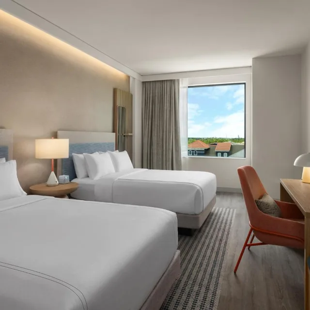 غرفة قياسية بسريرين كوين بحوض استحمام لذوي الإعاقة، Even Hotel Orlando Universal Blvd By Ihg 1/9