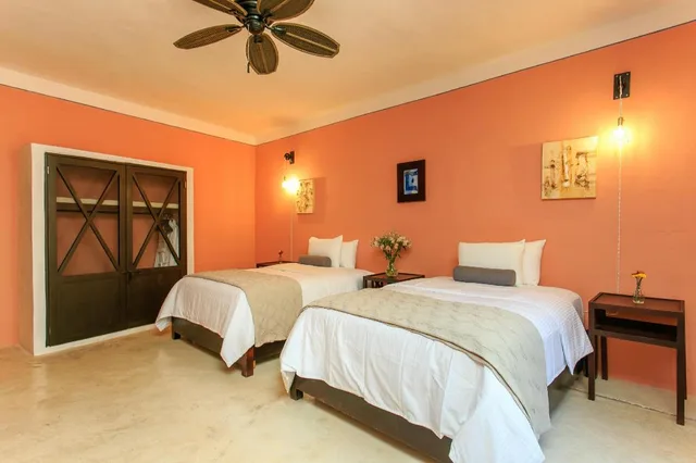 غرفة ديلوكس بسريرين منفصلين، Casa Jade Hotel - Adults Only Merida 1/2