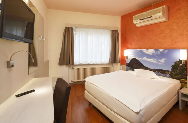 غرفة كومفورت مفردة بسرير كوين، Acquarello Swiss Quality Hotel 2/5