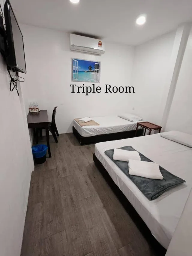 غرفة ديلوكس ثلاثية بسرير كوين وسرير فردي، Rasa Motel 3/3