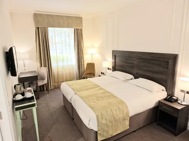غرفة قياسية بسرير مزدوج أو سريرين منفصلين، Astor Court Hotel 1/4
