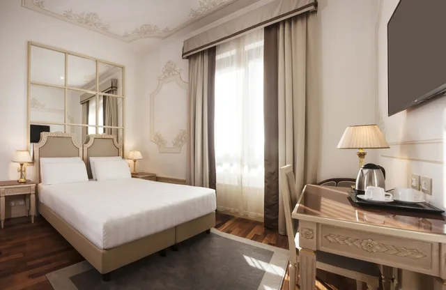 غرفة عائلية بسرير كوين وسرير فردي، Radisson Blu Ghr Hotel Rome 3/7
