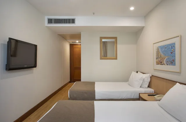غرفة قياسية بسريرين منفصلين، Windsor Plaza Copacabana 3/7