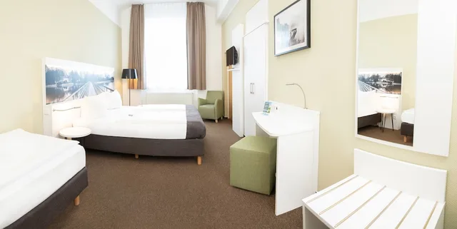 غرفة عائلية بسرير كوين وسرير فردي، Hotel Am Schlosspark 7/7