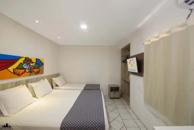 غرفة ديلوكس ثلاثية بسرير مزدوج وسرير فردي، Netuanah Praia Hotel 2/3