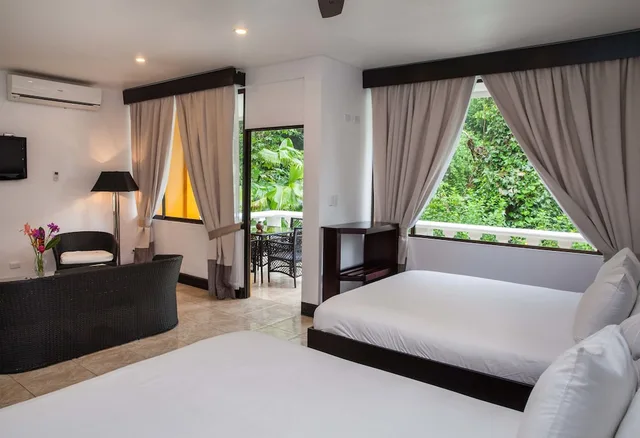 Premium, Quadruple, 2 Queen Beds, Tifakara Boutique Hotel 1/7