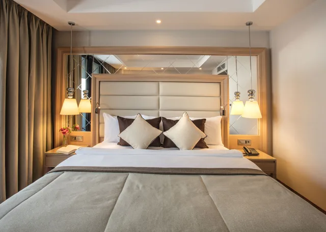 غرفة عائلية بسرير كينج وسريرين منفصلين، Korumar Ephesus Beach and Spa Resort 1/7