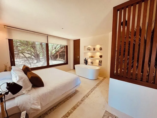 غرفة ديلوكس بسرير كينج بإطلالة جزئية على البحر بحوض استحمام، Hotel Casa Punta Coco & Beach Club - Adults Only 1/4