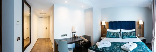 جناح جونيور بسرير كينج وسرير فردي مع أريكة، Elke Spa Hotel 2/6