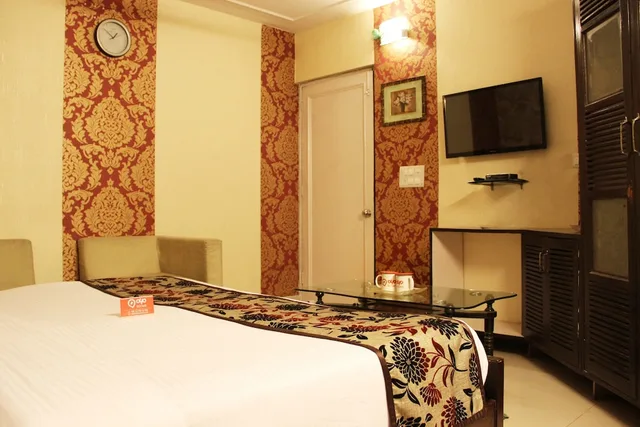 غرفة بسرير مزدوج أو سريرين منفصلين، Oyo 2407 Hotel Gera's M1 4/5