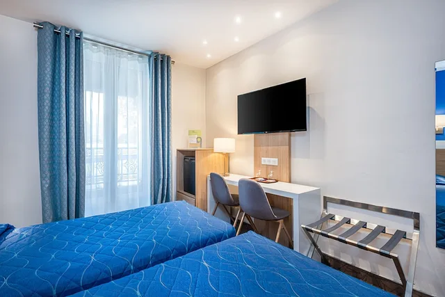 غرفة تنفيذية بسريرين منفصلين، HOTEL TERMINUS MONTPARNASSE 6/10