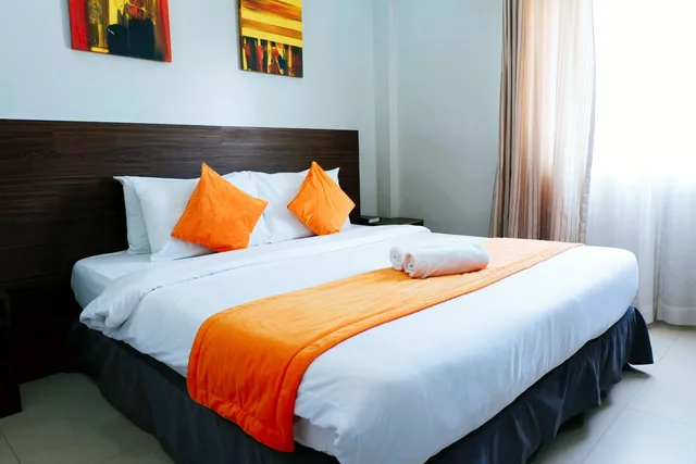 غرفة ديلوكس بسرير كينج، Holiday Suites Hotel Amp Resort 1/4