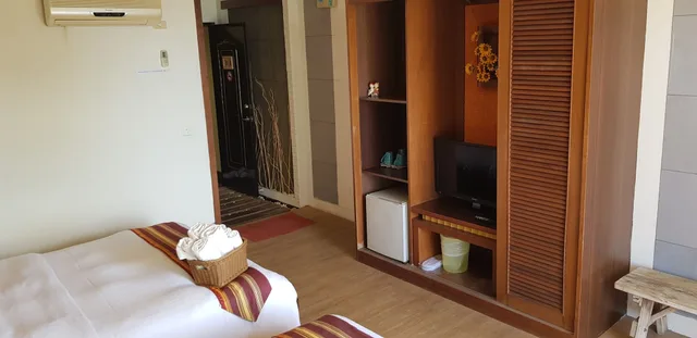 غرفة قياسية رباعية بسريرين مزدوجين بإطلالة على البحر، Ming-Jun Holiday Inn 5/10