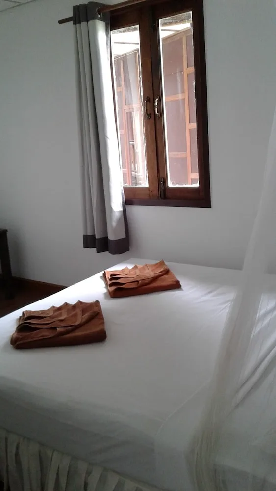 Standard, Double Bed, with Fan، Tropical Garden Bungalow 1/2