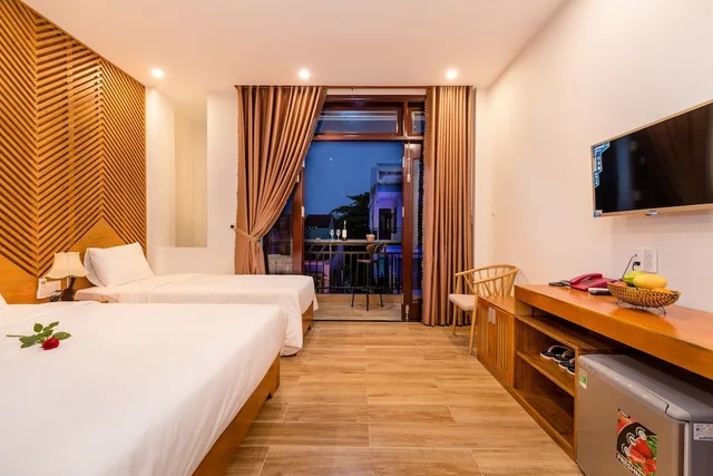 Deluxe, Triple, 1 King and 1 Single Beds, City View, Balcony, Phong Phu Villa Hoi An 1/6