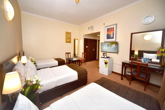 غرفة ثلاثية بسرير فردي، NEJOUM AL EMARATE HOTEL 5/8