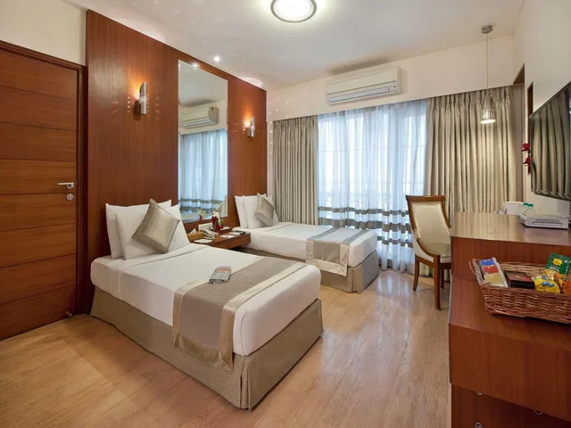 غرفة ديلوكس بسريرين منفصلين، Grand Residency Service Apartment 2/5