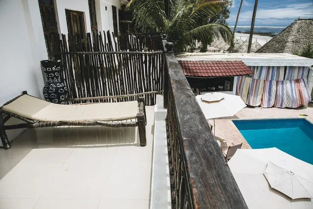 غرفة بسرير كينج بإطلالة على البحر بشرفة، Moonshine Uroa Boutique Hotel 3/3