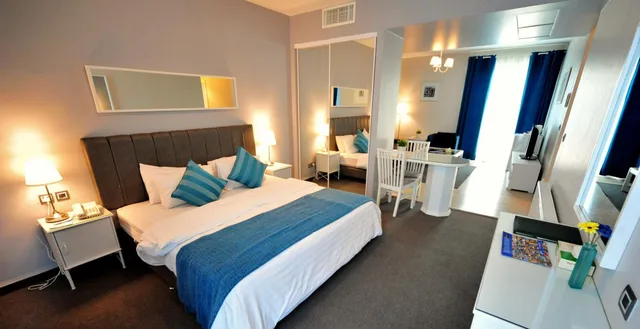 جناح جونيور بسرير مزدوج مع أريكة، THE CONROY BOUTIQUE HOTEL 1/5