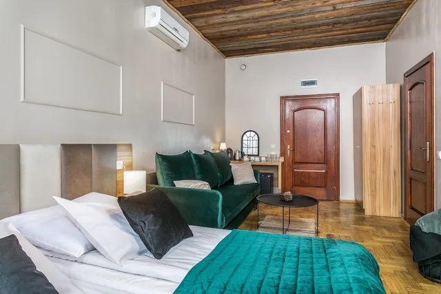 غرفة ديلوكس رباعية بسريرين منفصلين مع أريكة، Aparthotel Pergamin 5/7