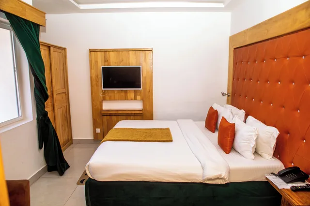 غرفة سوبيريور بسرير كوين بإطلالة على البحر، Hôtel Villa Les Orchidées 1/4