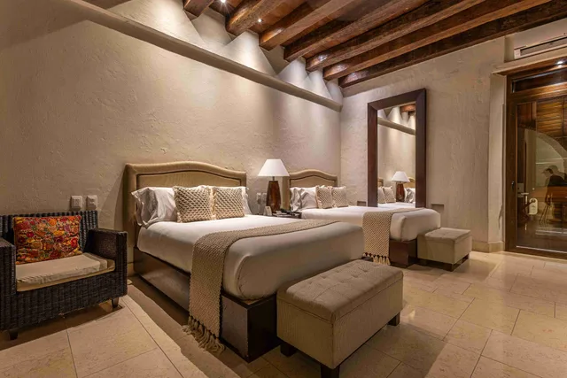 غرفة ديلوكس بسريرين منفصلين وسرير كينج، Ananda Hotel Boutique 1/2