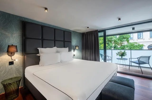 غرفة ديلوكس بسرير مزدوج بإطلالة على الحديقة بشرفة، Hotel Le Palais Gallien 3/6