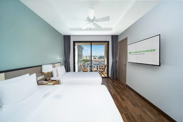 غرفة بسريرين منفصلين بإطلالة على البحر، Wyndham Garden Grandworld Phu Quoc 5/7